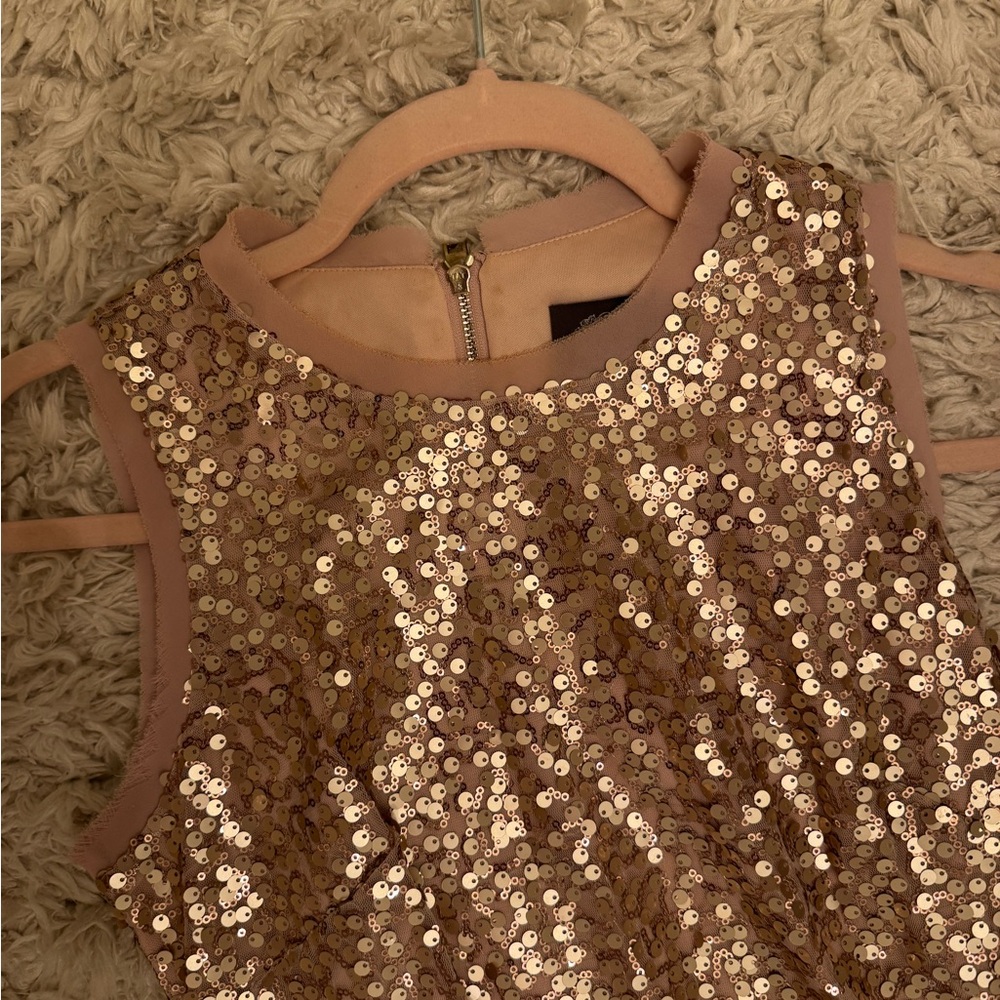 Vince Camuto Rose Gold Sequin Mini Dress
Stunning for any occasion. - Picture 10 of 14
